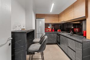 Kuchyň nebo kuchyňský kout v ubytování Designer Flat North & Parking