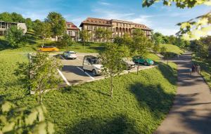 an overhead view of cars parked in a parking lot at Goethe Suite in Bad Frankenhausen +2 photos