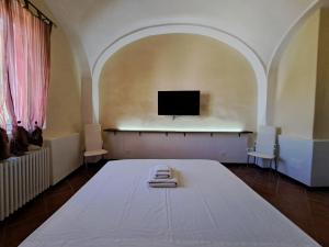 Телевизор и/или развлекательный центр в Dolce Stil Novi