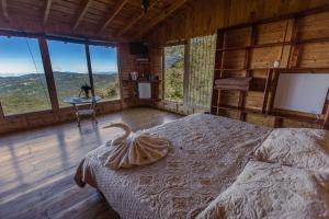 Postel nebo postele na pokoji v ubytování Paraíso Quetzal Lodge