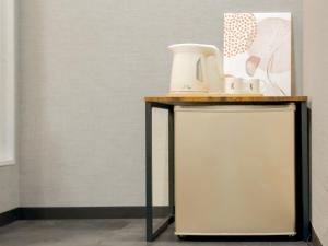 a table with some items on top of it at MANDO Hotel 101 in Tokyo