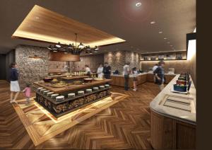 a kitchen with a counter with people standing in it at TAOYA Hakone in Hakone