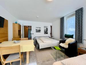 Ένα ή περισσότερα κρεβάτια σε δωμάτιο στο Hüttenzauber, Montana Haus +13 φωτογραφίες