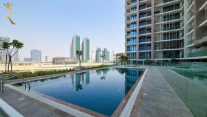 Πισίνα στο ή κοντά στο Elegant 1BR Escape Al Maryah Vista