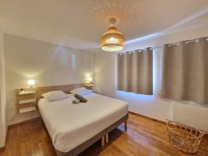 Postel nebo postele na pokoji v ubytování Le Grand Monteix #Duplex#Charme