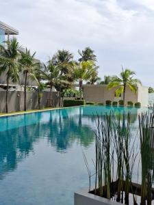 Kolam renang di atau dekat dengan Beachfront condominium - Pattaya