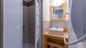 a bathroom with a sink and a shower at J de Balnea B N 205 - 4P6 in Loudenvielle +4 photos