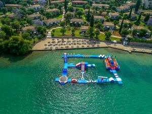 an aerial view of an amusement park in the water at Dreams Corfu Resort & Spa - All Inclusive in Gouvia