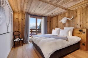 Postel nebo postele na pokoji v ubytování Appartement Élégance Mont Blanc - Welkeys