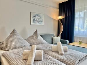 Ένα ή περισσότερα κρεβάτια σε δωμάτιο στο Gipfeltreff, Montana Haus +17 φωτογραφίες