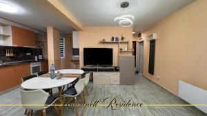 Μια τηλεόραση ή/και κέντρο ψυχαγωγίας στο Antoanett Residence