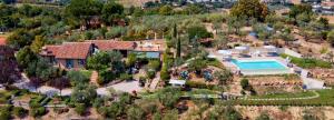 an aerial view of a house with a swimming pool at Agriturismo Collerisana in Spoleto