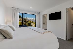 Katil atau katil-katil dalam bilik di Remarkable Lakeview Escape