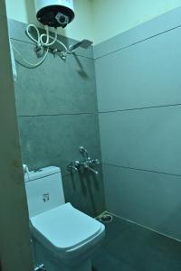 Koupelna v ubytování Mysore Heritage INN + 31 fotografií