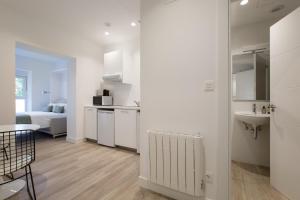 Kuchyň nebo kuchyňský kout v ubytování Bilbao Living Lofts