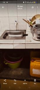 Η κουζίνα ή μικρή κουζίνα στο Swahili homes bnb