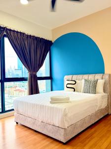 Ένα ή περισσότερα κρεβάτια σε δωμάτιο στο Sunway velocity V residence Luxurious Home stylish apartment