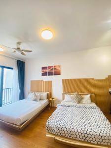 Postel nebo postele na pokoji v ubytování Klcc Service Suites By Chamber