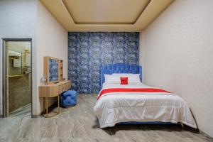 Кровать или кровати в номере RedDoorz Plus Syariah @ Tiban Centre Batam