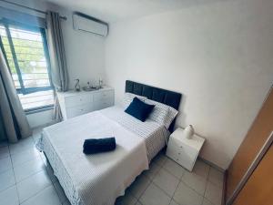 Katil atau katil-katil dalam bilik di Dormir à Praia Cap vert au bord de mer