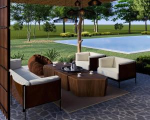 eine Terrasse mit Tisch und Stühlen und einem Pool in der Unterkunft Chaarya Lake in Nikawatawana