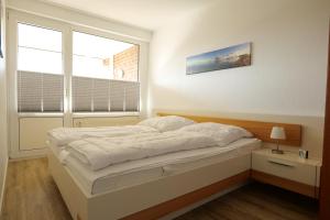 Katil atau katil-katil dalam bilik di Haus Trafalgar Whg. 242 Möwennest +6 gambar