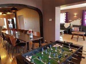 a room with a table and a large chess board at Luxury Villa with Sauna in Francorchamps