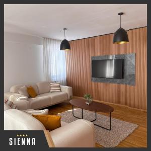 TV a/nebo společenská místnost v ubytování La Vita Penthouse by Sienna