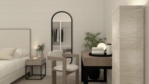 Ένα ή περισσότερα κρεβάτια σε δωμάτιο στο Villa Augusta Spa & Garden