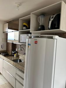 Dapur atau dapur kecil di Ap com localização Privilegiada - Com Ar