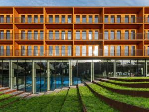 an external view of a building with a swimming pool at Inger Hotell in Narva