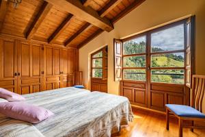 Ένα ή περισσότερα κρεβάτια σε δωμάτιο στο Casa Mesilda