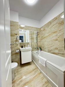 Koupelna v ubytování Bucharest Luxury Glam Apartments City Center Area