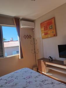 Condomínio Sol de Verao電視和／或娛樂中心