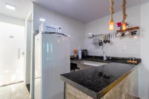 Kuchyň nebo kuchyňský kout v ubytování Loft em condominio com mar em Mangaratiba + 16 fotografií