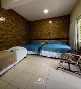Katil atau katil-katil dalam bilik di pousada marrocos