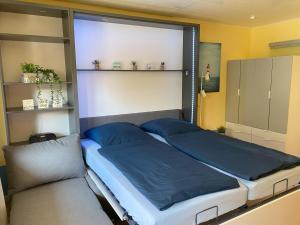 Postel nebo postele na pokoji v ubytování Ferienwohnung "Roter Sand" + 59 fotografií