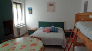 Postel nebo postele na pokoji v ubytování Mont Gelé