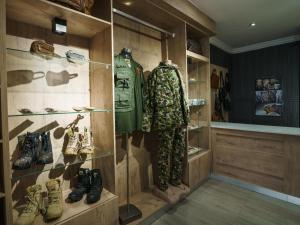 a display case in a store with shoes on display at Humdani Safaris Free State in Virginia