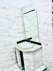 a bathroom with a sink and a mirror at Villa Thisansa in Mirissa +40 photos