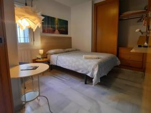 Postel nebo postele na pokoji v ubytování CASA HONDA10