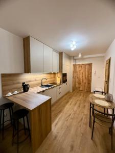 Η κουζίνα ή μικρή κουζίνα στο LOFT Apartament I Opole