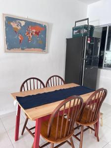 Η κουζίνα ή μικρή κουζίνα στο Affordable Stay in Tasik Raban
