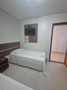 Katil atau katil-katil dalam bilik di Hotel Capelari