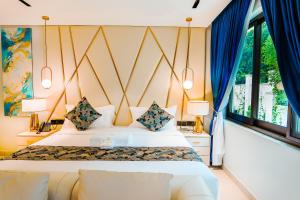 Postel nebo postele na pokoji v ubytování Hotel Noesis + 81 fotografií