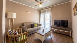 Телевизор и/или развлекательный центр в Arteon villas