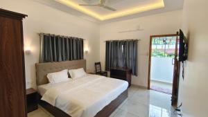 Postel nebo postele na pokoji v ubytování Misty Morning