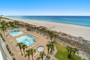 an overhead view of a beach with two pools and palm trees at Summit 808 - Luxury Beach Resort Condo 1-6 People in Panama City Beach