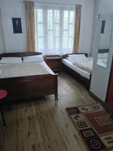 Postel nebo postele na pokoji v ubytování Yuven House