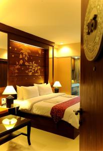 Postel nebo postele na pokoji v ubytování Mariya Boutique Hotel At Suvarnabhumi Airport